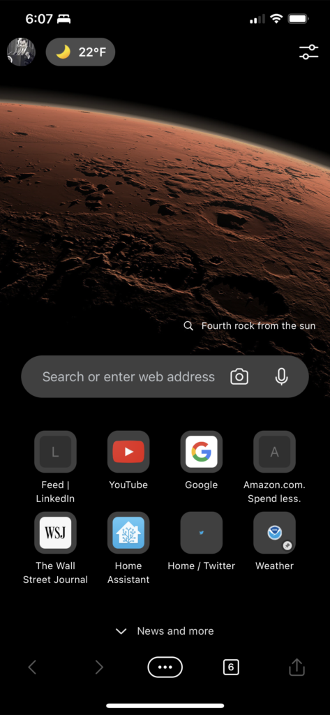 A screen shot of Microsoft Edge on iOS landing page showing a magnificent picture of Mars.